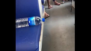 SLIPPERS DANCING IN AN EXPRESS TRAIN -(This young girl was listening to music.Her right foot was in the air. She was dancing her feet and toes according to the beat. Unfortunately one idiot came and interrupted her foot dangling.Her toes nails are pi